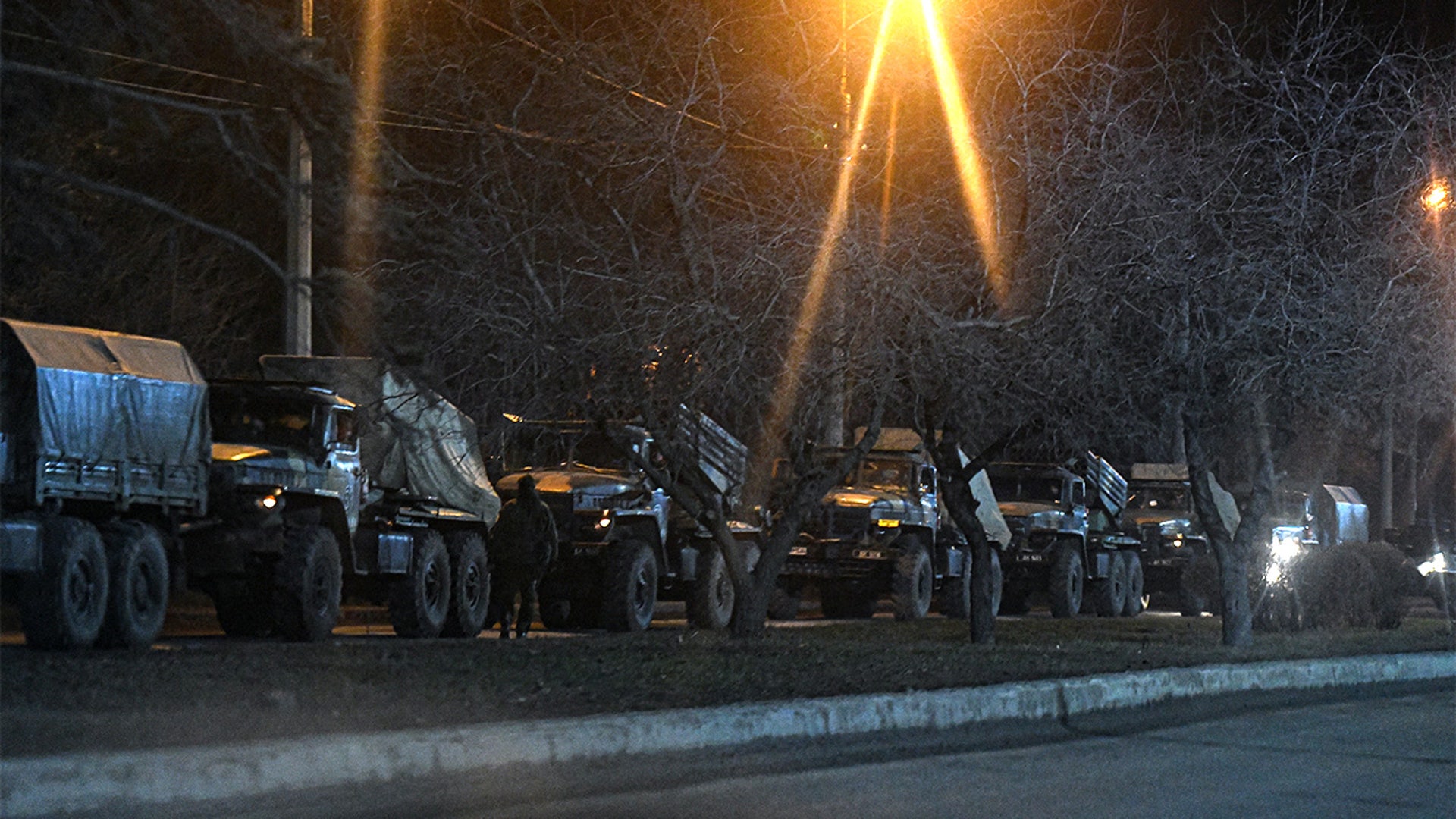 Russian military tanks and armored vehicles advance in Donetsk, Ukraine on February 24, 2022.