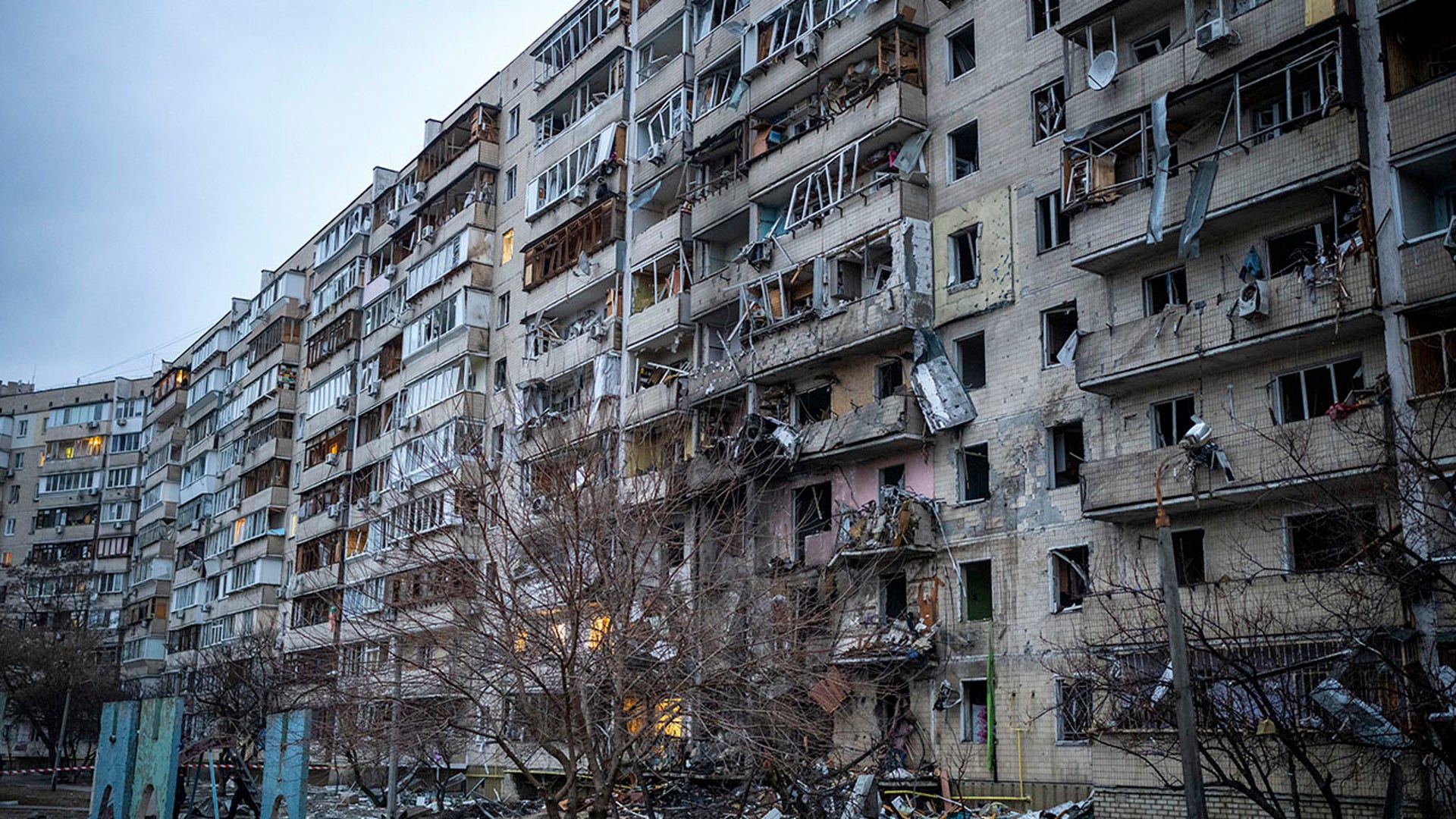 View of a building damaged following a rocket attack the city of Kyiv, Ukraine, Friday, Feb. 25, 2022. (AP Photo/Emilio Morenatti)