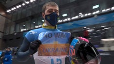 Olympian displays sign calling for 'No War in Ukraine'