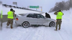 Missouri National Guard troops aid stranded drivers during winter storm