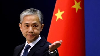 China says US is 'playing up' Russia threat to Ukraine