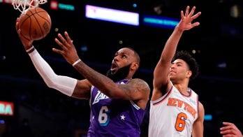 LeBron James returns with triple-double, Lakers beat Knicks in OT