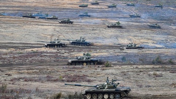 Belarus checks combat readiness on border, Ukraine secures Kyiv defenses