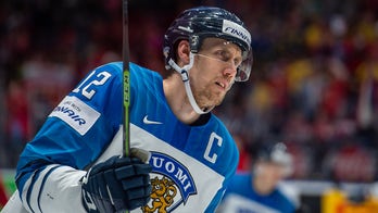 Finland's ice hockey coach accuses China of not respecting human rights as player remains in COVID isolation