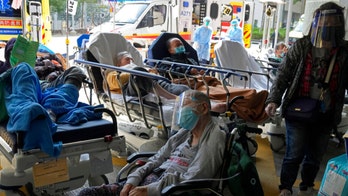 Hong Kong’s COVID-19 success accelerates omicron surge