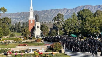 Los Angeles police officer Fernando Arroyos, killed in shootout with alleged gang members, laid to rest