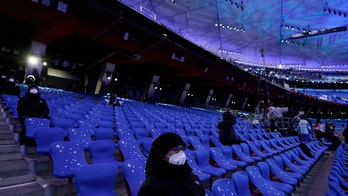 China's pandemic Olympics begins, with lockdown and boycotts