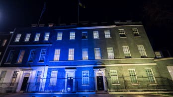 Cities across the globe light up in blue and yellow in solidarity with Ukraine