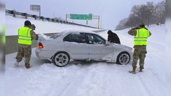 Missouri National Guard troops aid stranded drivers during winter storm