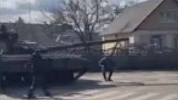 Ukrainian man squares up with Russian tank as invasion continues