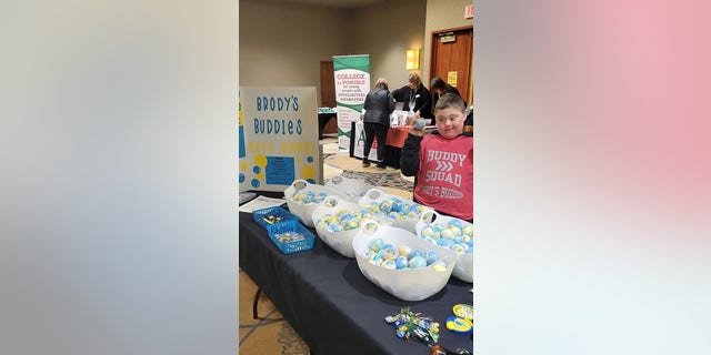 Brody Klein selling his bath bombs. The Klein family spends every year raising awareness for World Down Syndrome Day.