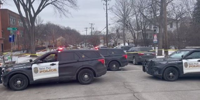 A St. Paul police cruiser is stationed feet from where one person was killed and several others were injured during a shooting in February.