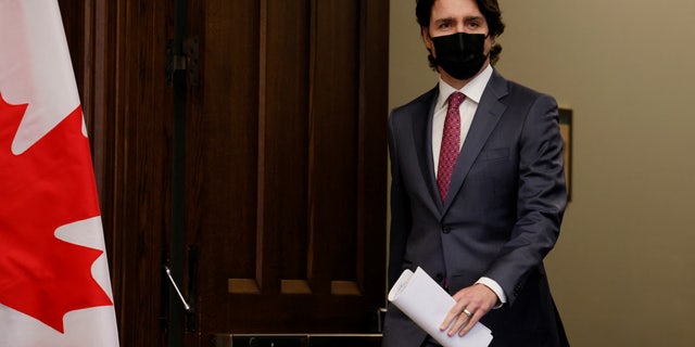 Canada Prime Minister Justin Trudeau arrives to a news conference on Parliament Hill in Ottawa, Ontario, Canada, Feb, 14, 2022.