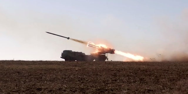 A Russian "Uragan" self-propelled multiple rocket launcher system launches a rocket during military exercises at the Opuk training area in Crimea, February 15, 2022.