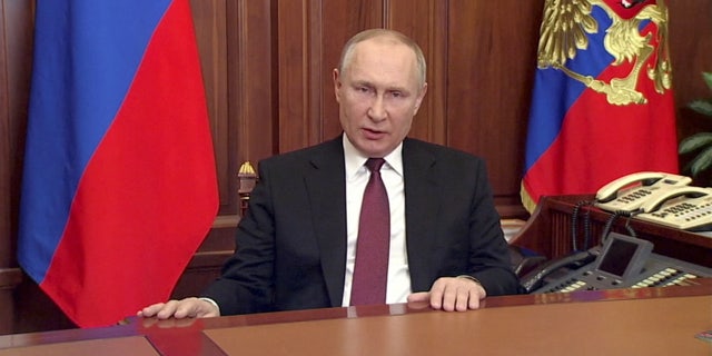 Russian President Vladimir Putin delivers a video address announcing the start of the military operation in eastern Ukraine, in Moscow, Russia, in a still image taken from video footage released February 24, 2022.