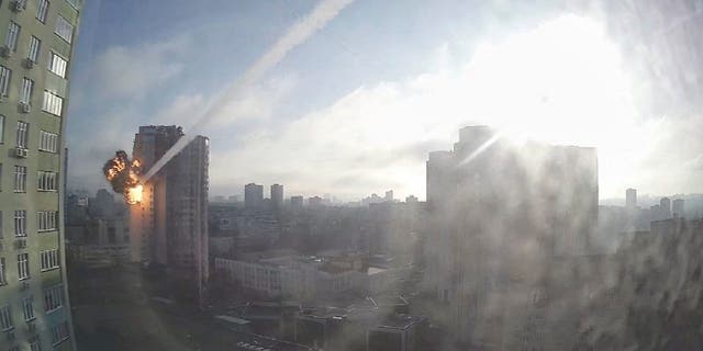 Kiev, Texas-born Ukrainian exchange student with family at home: 'I would like to help them somehow' - Reuters 5 Surveillance footage shows a missile hitting a residential building in Kiev, Ukraine, February 26, 2022, in this still image taken from video.