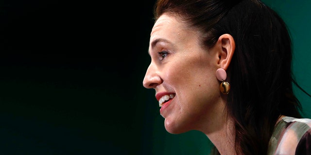 New Zealand Prime Minister Jacinda Ardern outlines the government's plans, Thursday, Feb. 3, 2022, that will dismantle its quarantine system and reopen its borders to the world. (Associated Press)