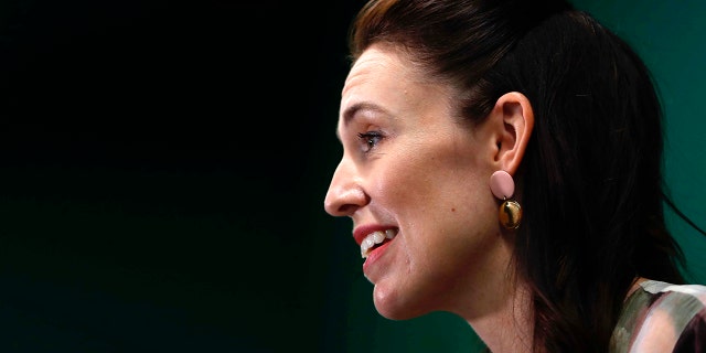 New Zealand Prime Minister Jacinda Ardern outlines the government's plans, Thursday, Feb. 3, 2022, that will dismantle its quarantine system and reopen its borders to the world. (Associated Press)