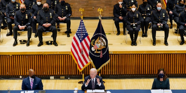 President Joe Biden speaks at an event with New York City Mayor Eric Adams, seated left, and Gov. Kathy Hochul, D-N.Y., seated right, to discuss gun violence strategies, at police headquarters, Thursday, Feb. 3, 2022, in New York. 