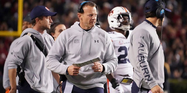 Auburn still examining Bryan Harsin's handling of football program 3 FILE - Auburn head coach Bryan Harsin walks near the sideline during a timeout in the first half of an NCAA college football game against South Carolina on Nov. 20, 2021, in Columbia, SC Harsin says he is "not planning on going anywhere" as he tries to navigate a tumultuous offseason of turnover in his program. Auburn went 6-7 in its first season under Harsin, who was hired away from Boise State a little more than 13 months ago.