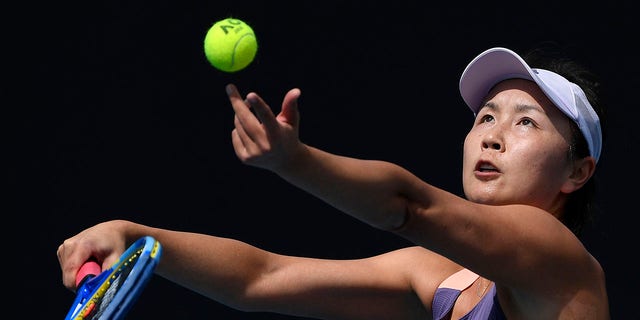Peng Shuai serves to Nao Hibino during their first round singles match at the Australian Open in Melbourne on January 21, 2020.