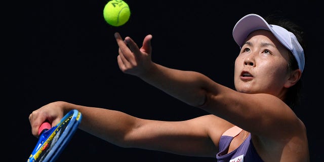 Peng Shuai serves to Nao Hibino during their first-round singles match at the Australian Open in Melbourne on Jan. 21, 2020.