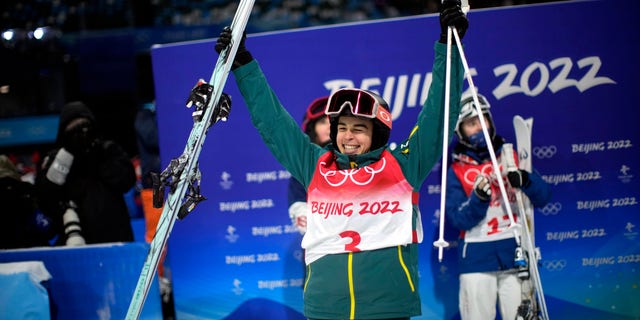 Australia's Jakara Anthony celebrates after winning the gold medal for the women's moguls finals at Genting Snow Park at the 2022 Winter Olympics, Sunday, Feb. 6, 2022, in Zhangjiakou, China. 