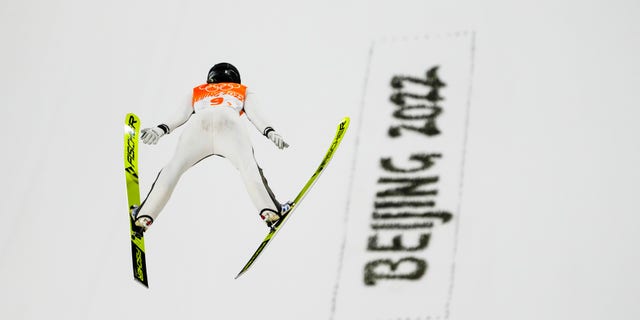 Slovenia wins Olympic debut of ski jumping mixed team event 3 Ursa Bogataz of Slovenia flies through the air during the mixed team trial round at the 2022 Winter Olympics on Monday, February 7, in Zhangjiako, China.