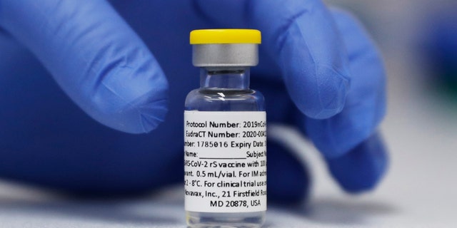 A vial of the Phase 3 Novavax coronavirus vaccine prepared for use in a trial at St. George's University hospital in London. 