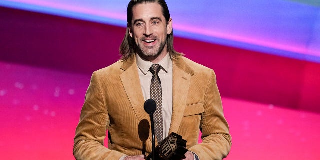 Aaron Rodgers of the Green Bay Packers receives the AP Most Valuable Player of the Year Award at the NFL Honors show, Feb. 10, 2022, in Inglewood, California.