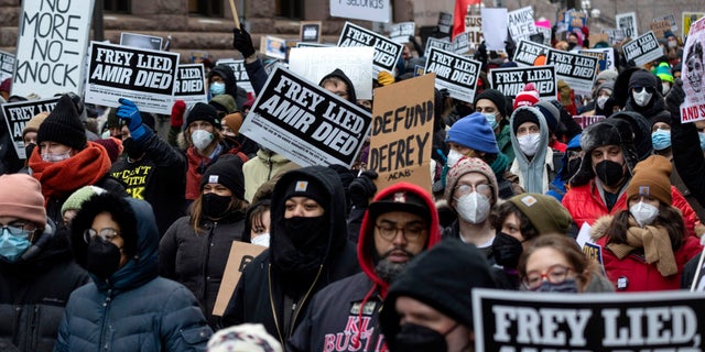 People march at the Amir Rock rally in Minneapolis, Saturday, February 5, 2022.  Minneapolis will hold a funeral on Thursday, February 17, 2022 for The Rock, a 22-year-old black man who was shot by Minneapolis police earlier this month when he executed a search warrant. 