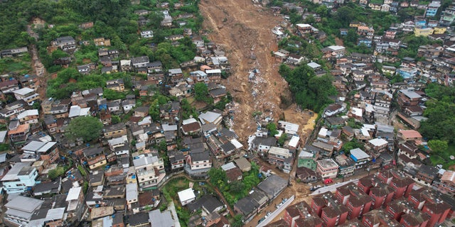 An aerial view shows a neighborhood affected by landslides in Petropolis, Brazil, Wednesday, Feb. 16, 2022. 