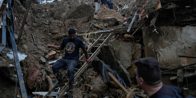 Several streets remained inaccessible as cars and household goods piled up, blocking access to higher parts of the city.