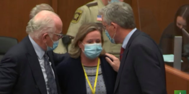 In this screen grab from video, former Brooklyn Center Police Officer Kim Potter center, with defense attorney Earl Gray, left, and Paul Engh talk after the verdict is read Dec. 23, 2021 in Potter's trial for the April 11, 2021, death of Daunte Wright, at the Hennepin County Courthouse in Minneapolis, Minn. 