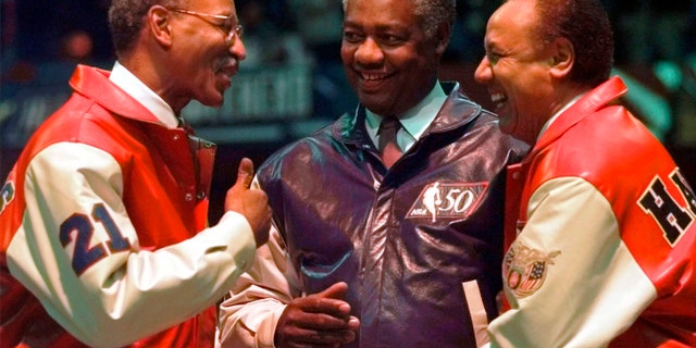 NBA Legends Dave Bing, left, Oscar Robertson, center, and Lenny Wilkens chat during halftime ceremonies of the NBA All-Star game Sunday, Feb. 9, 1997, in Cleveland.