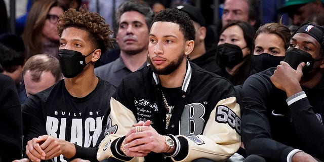 Brooklyn Nets forward Ben Simmons sits on the bench during the second half of a game against the New York Knicks Feb. 16, 2022, in New York.
