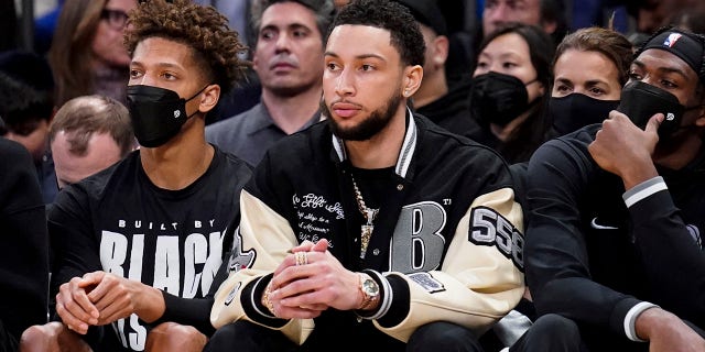 Brooklyn Nets forward Ben Simmons sits on the bench during the second half of a game against the New York Knicks on February 16, 2022 in New York.