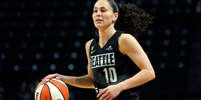 FILE - Seattle Storm's Sue Bird dribbles in the first half of a WNBA second round playoff basketball game against the Phoenix Mercury, Sunday, Sept. 26, 2021, in Everett, Wash. Sue Bird officially re-signed Friday, Feb. 18, 2022, with the Seattle Storm, her only WNBA team, in what is expected to be her final season.