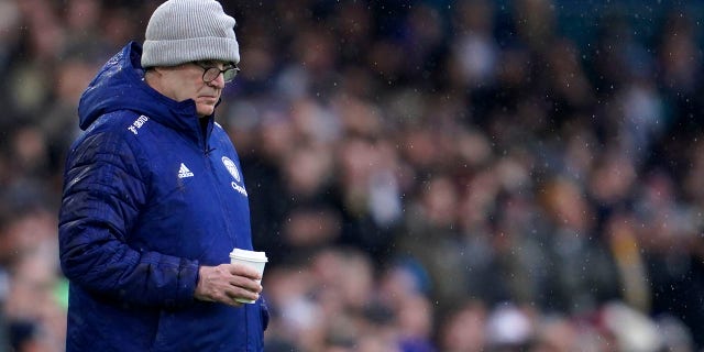 Leeds United's head coach Marcelo Bielsa looks out during the English Premier League soccer match between Leeds United and Manchester United, at Elland Road Stadium in Leeds, England, Sunday, Feb. 20, 2022.