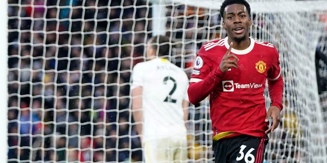 Manchester United's Anthony Elanga celebrates after scoring his side's fourth goal during the English Premier League soccer match between Leeds United and Manchester United, at Elland Road Stadium in Leeds, England, Sunday, Feb. 20, 2022.