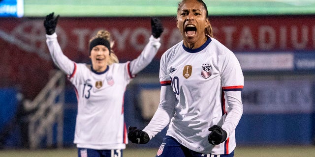 U.S. forward Catarina Macario (20) and midfielder Ashley Sanchez (13) celebrate Macario's goal during the first half against Iceland in a SheBelieves Cup soccer match Wednesday, Feb. 23, 2022 in Frisco, Texas.