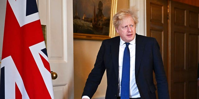 Britain's Prime Minister Boris Johnson arrives to deliver an address on the attack by Russia on Ukraine