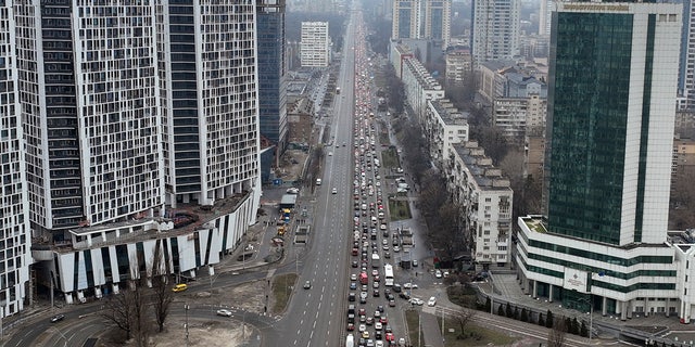 Traffic jams are seen as people leave the city of Kyiv, Ukraine, Thursday, Feb. 24, 2022.