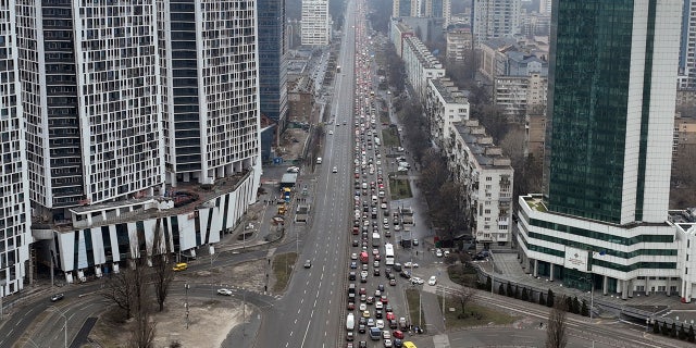 Traffic jams are seen as people leave the city of Kyiv, Ukraine, Thursday, Feb. 24, 2022.