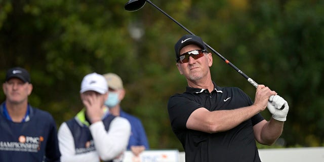 FILE - David Duval watches his tee shot on the first hole during the final round of the PNC Championship golf tournament, Sunday, Dec. 20, 2020, in Orlando, Fla. Entering his third PGA Tour Champions start in Arizona this week, Duval is still trying to find the rhythm of playing competitive golf on a regular basis again.
