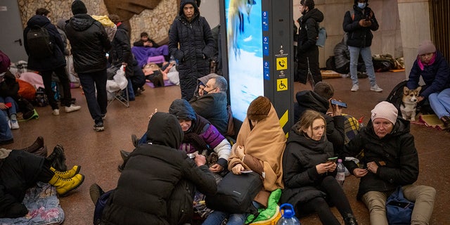 People rest in the Kiev metro, using it as a bomb shelter in Kiev, Ukraine, Thursday, February 24, 2022. 