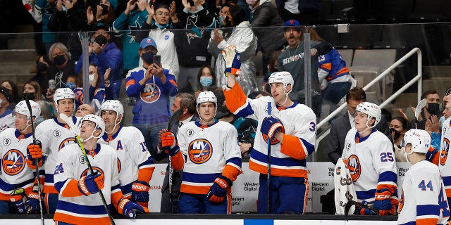 New York Islanders defenseman Zdeno Chara waves to the crowd as he is acknowledged for breaking Chris Chelios' league record for games played by a defenseman, during the first period of the team's NHL hockey game against San Jose Sharks in San Jose, Calif., Thursday, Feb. 24, 2022.Â
