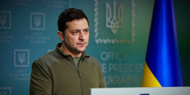 In this photo provided by the Ukrainian Presidential Press Office, Ukrainian President Volodymyr Zelenskyy delivers his speech addressing the nation in Kyiv, Ukraine, Friday, Feb. 25, 2022. Russian troops bore down on Ukraine's capital Friday, with explosions and gunfire sounding in the city as the invasion of a democratic country fueled fears of wider war in Europe and triggered new international efforts — including direct sanctions on President Vladimir Putin — to make Moscow stop.
