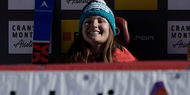 Switzerland's Priska Nufer smiles at finish after completing an alpine ski, women's World Cup downhill race, in Crans Montana, Switzerland, Sunday, Feb. 27, 2022.