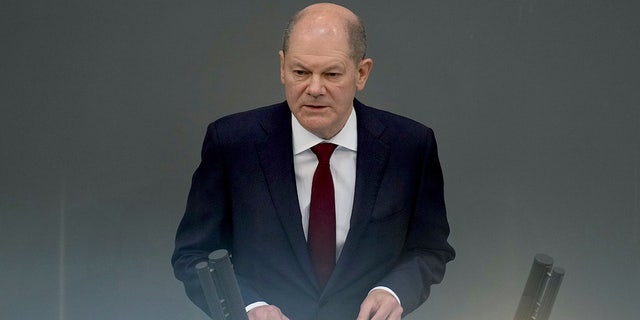 German Chancellor Olaf Scholz delivers a speech on the Russian invasion of Ukraine.